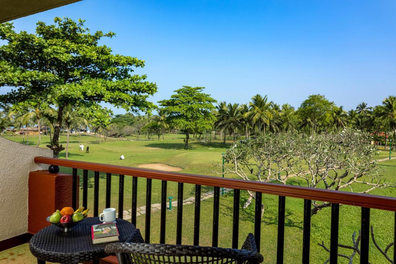 Caravela Beach Resort Varca Exterior foto Golf course at the hotel