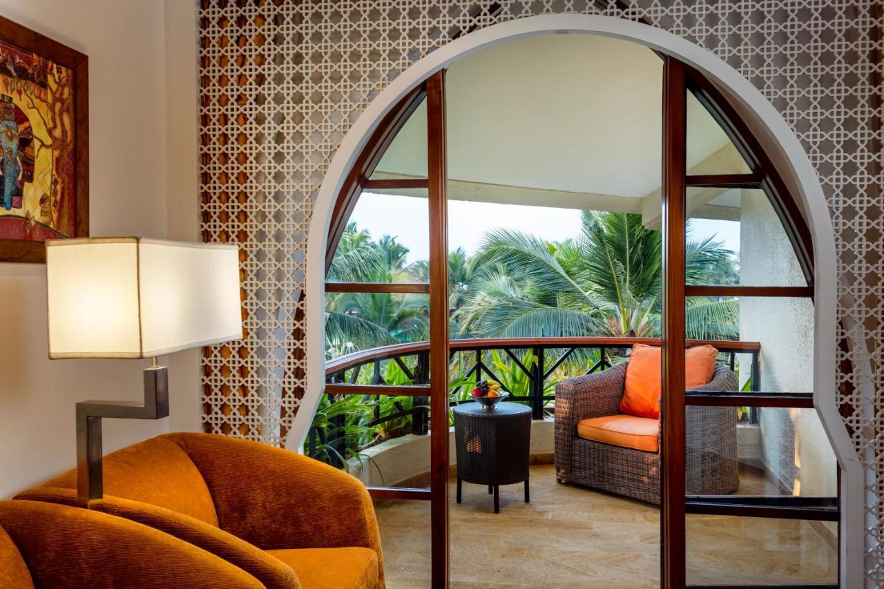 Caravela Beach Resort Varca Exterior foto A room at the Taj Bengal