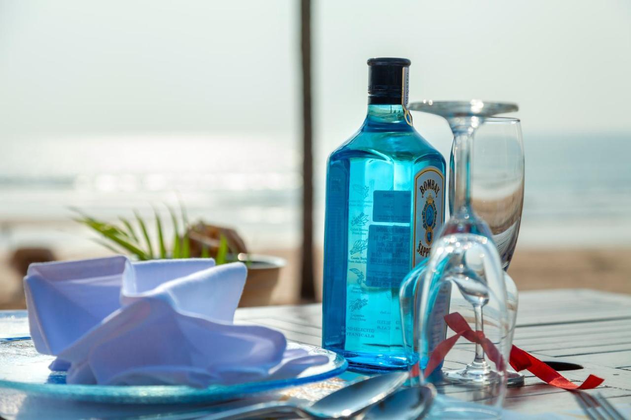 Caravela Beach Resort Varca Exterior foto A bottle of Blue Curaçao