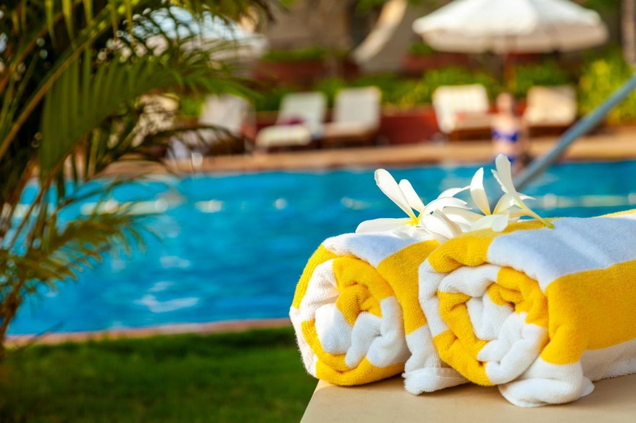 Caravela Beach Resort Varca Exterior foto Pool towels