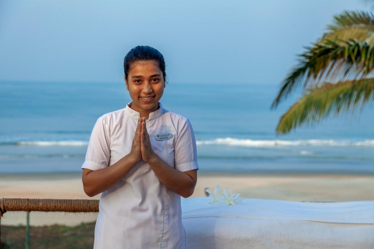 Caravela Beach Resort Varca Exterior foto A hotel employee in India